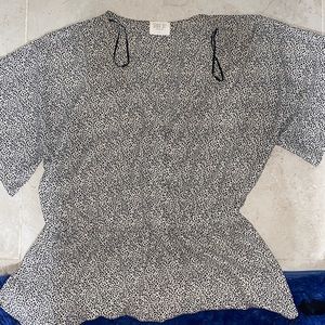 Slight peplum blouse